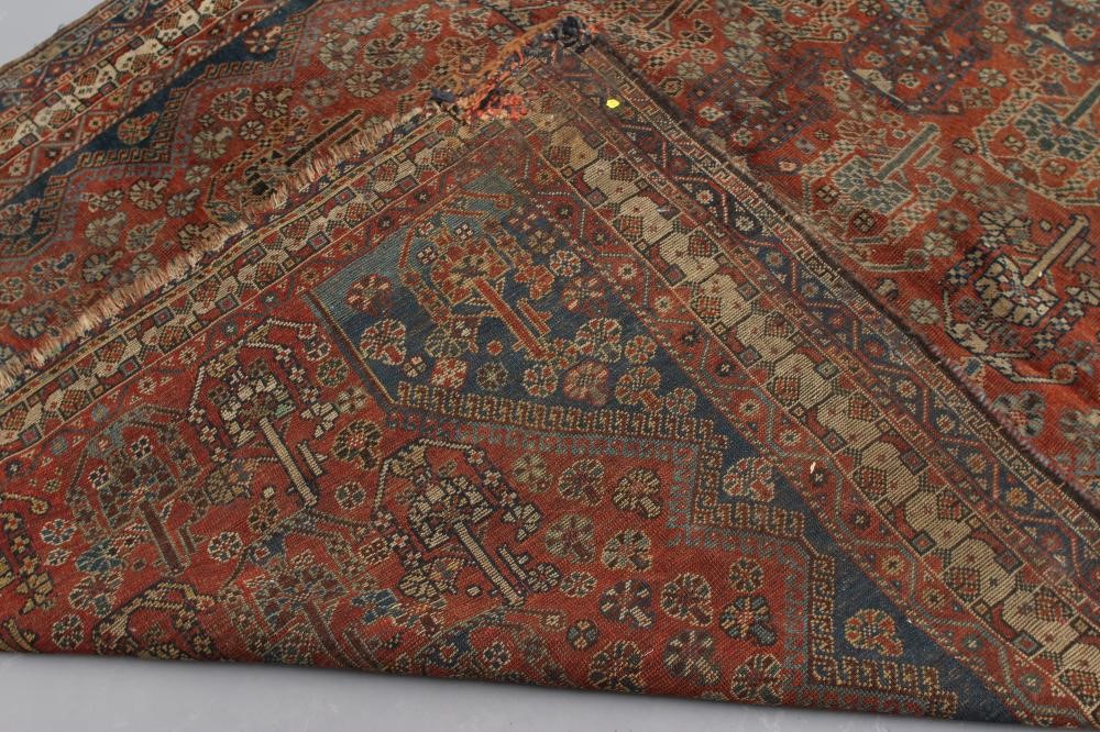 A PERSIAN TRIBAL RUG Image