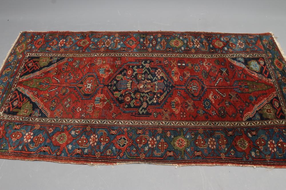 A PERSIAN TRIBAL RUG Image