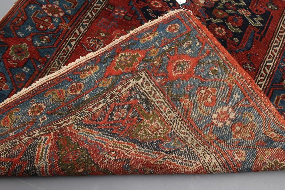 A PERSIAN TRIBAL RUG Image