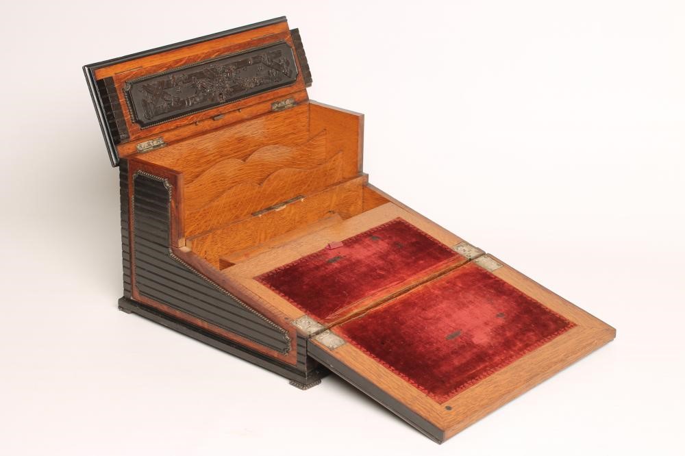 A VICTORIAN OAK WRITING SLOPE Image