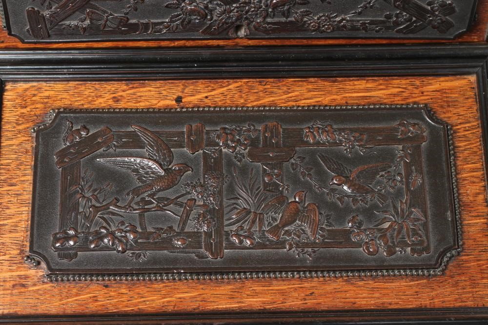 A VICTORIAN OAK WRITING SLOPE Image