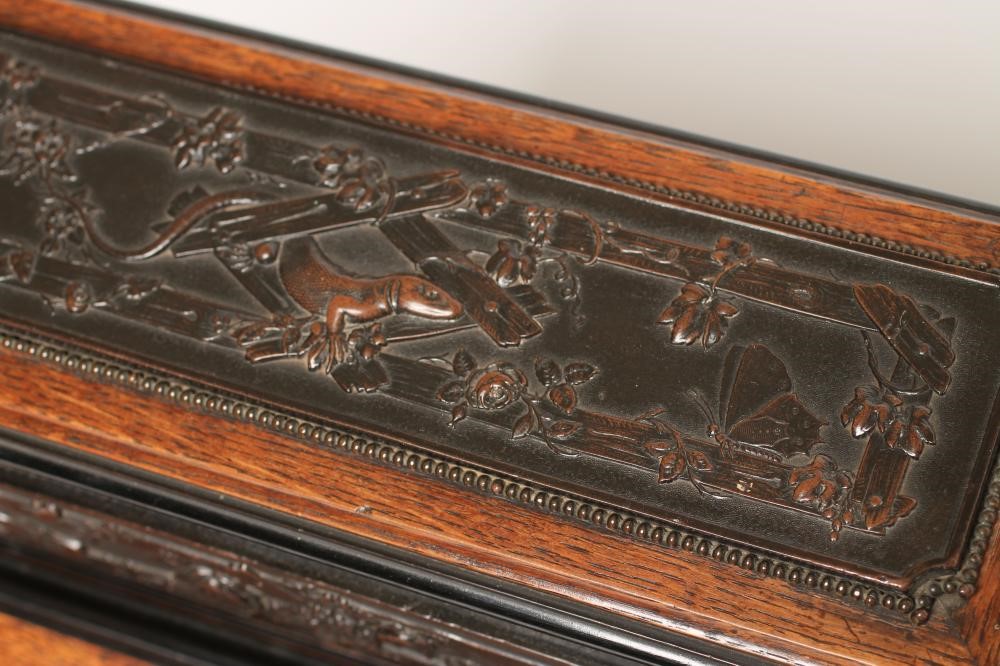 A VICTORIAN OAK WRITING SLOPE Image