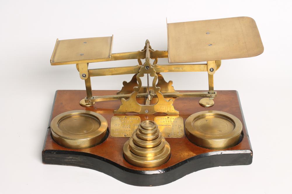 A SET OF BRASS POSTAL SCALES Image
