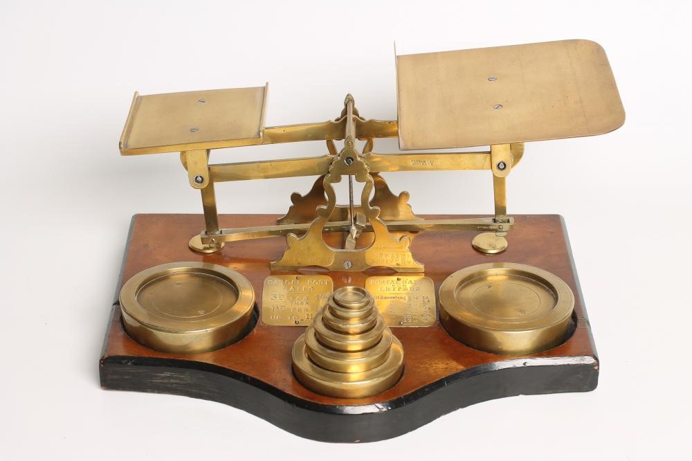 A SET OF BRASS POSTAL SCALES Image