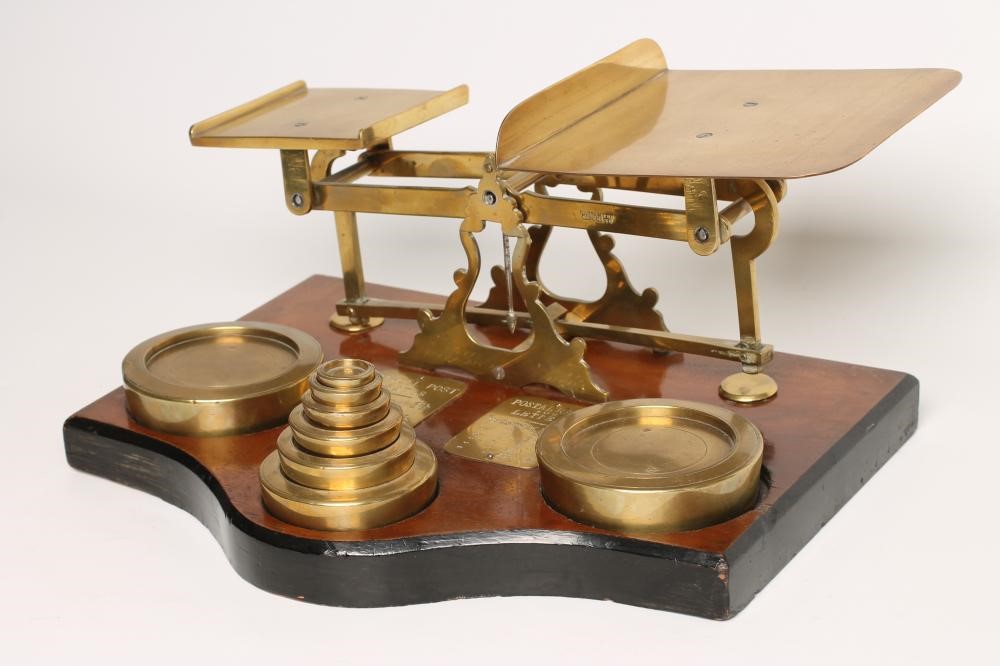 A SET OF BRASS POSTAL SCALES Image