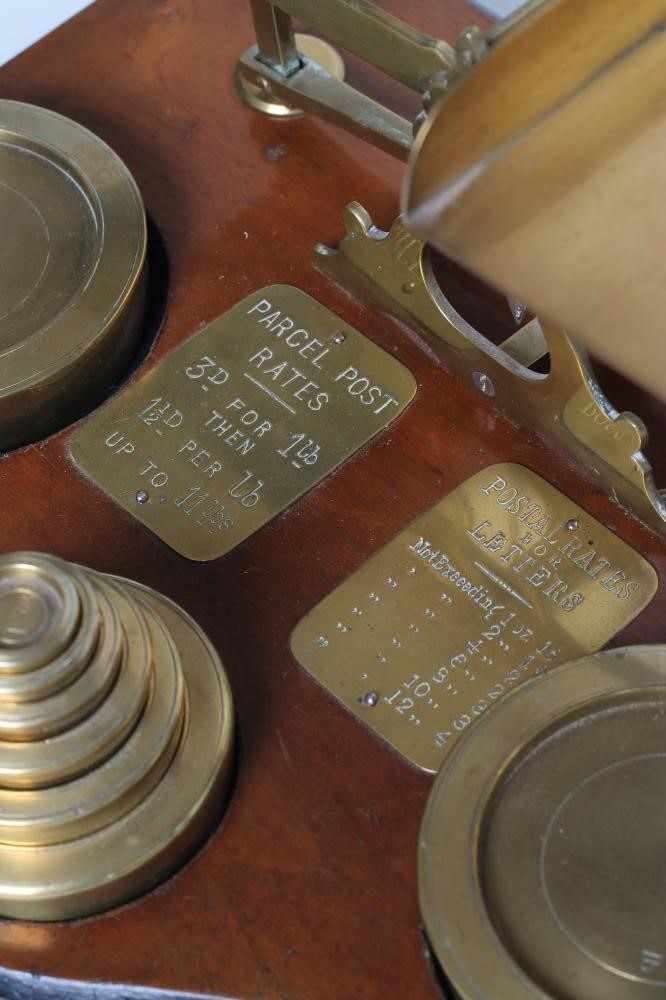 A SET OF BRASS POSTAL SCALES Image