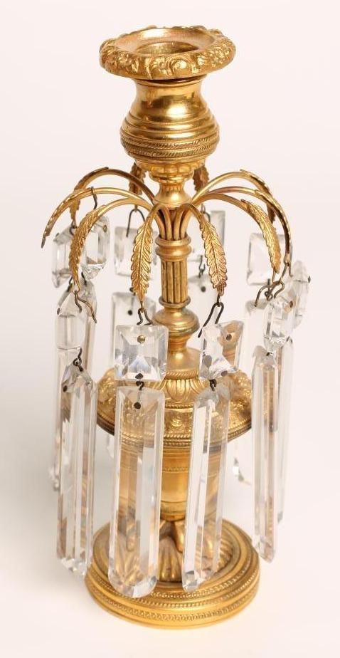 A PAIR OF REGENCY GILT METAL CANDLE LUSTRES Image