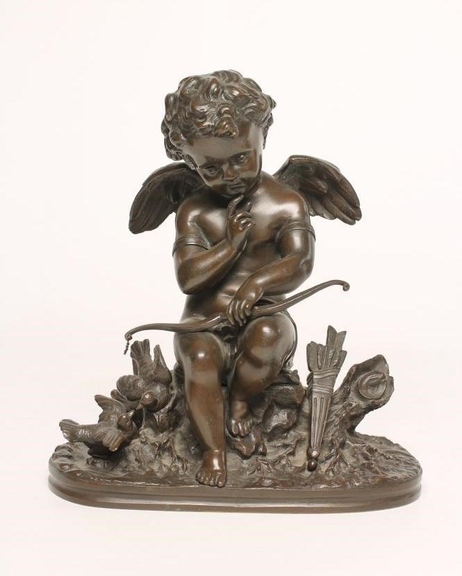 A BRONZE FIGURE OF CUPID Image