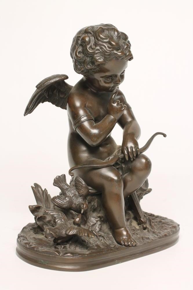 A BRONZE FIGURE OF CUPID Image