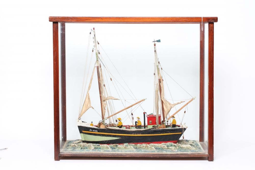 A FOLK ART WOOD MODEL OF A FISHING BOAT Image