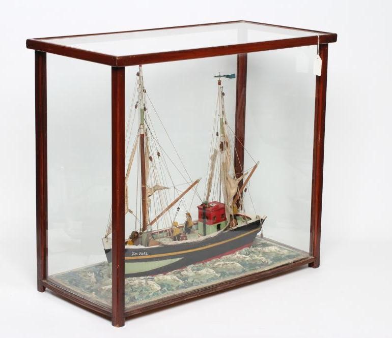 A FOLK ART WOOD MODEL OF A FISHING BOAT Image