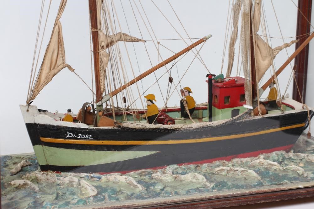 A FOLK ART WOOD MODEL OF A FISHING BOAT Image