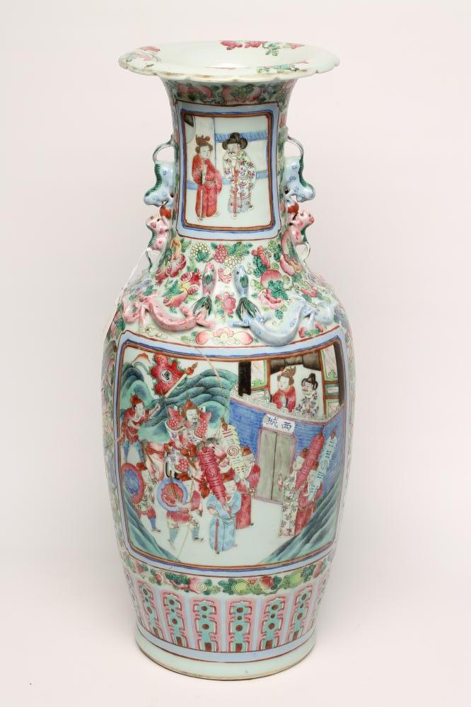 A CANTONESE PORCELAIN VASE of rounded cylindrical form with chi-long handles and everted rim Image