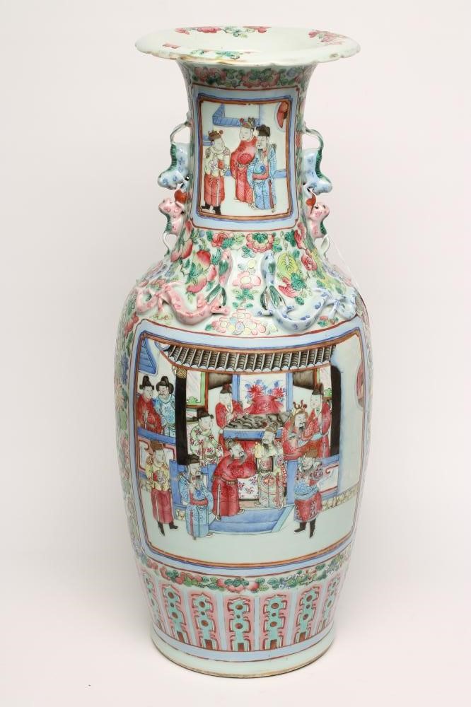A CANTONESE PORCELAIN VASE of rounded cylindrical form with chi-long handles and everted rim Image
