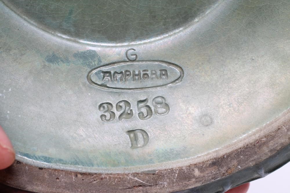 AN AMPHORA EARTHENWARE SECESSIONIST VASE with high neck and rounded conical base moulded in relief Image