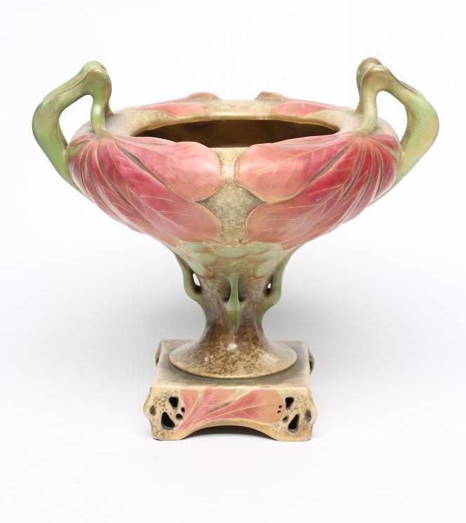 AN AMPHORA EARTHENWARE ART NOUVEAU PEDESTAL DISH of rounded conical form moulded with large leaves Image