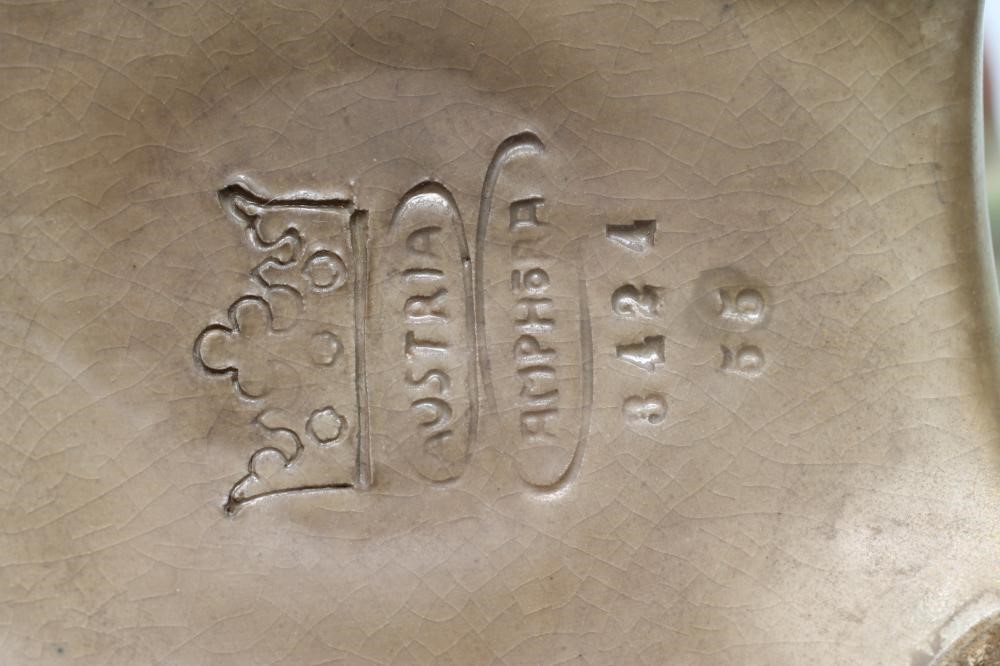 AN AMPHORA EARTHENWARE ART NOUVEAU PEDESTAL DISH of rounded conical form moulded with large leaves Image