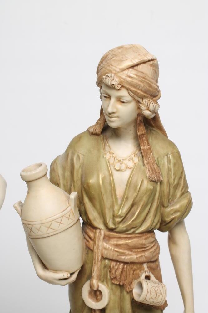 A MATCHED PAIR OF ROYAL DUX BISQUE PORCELAIN FIGURES Image