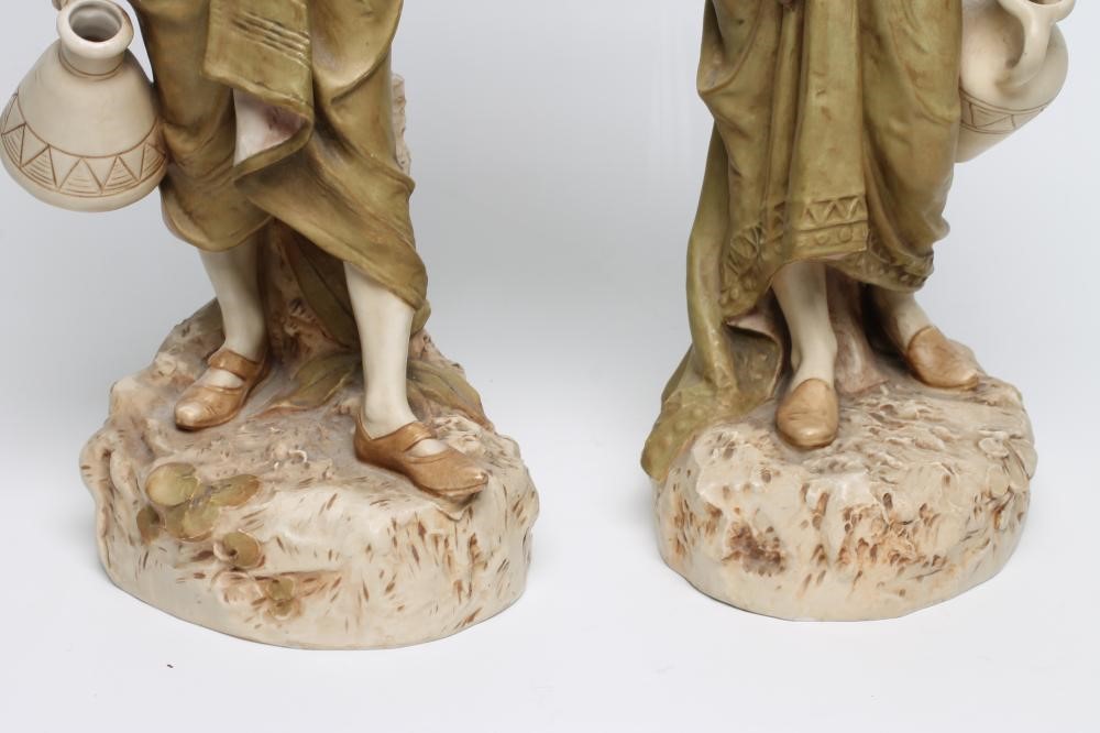 A MATCHED PAIR OF ROYAL DUX BISQUE PORCELAIN FIGURES Image
