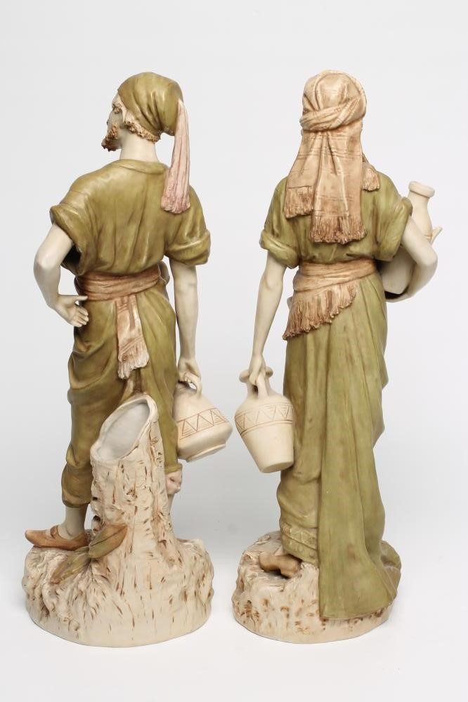 A MATCHED PAIR OF ROYAL DUX BISQUE PORCELAIN FIGURES Image