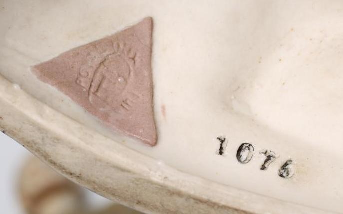 A MATCHED PAIR OF ROYAL DUX BISQUE PORCELAIN FIGURES Image