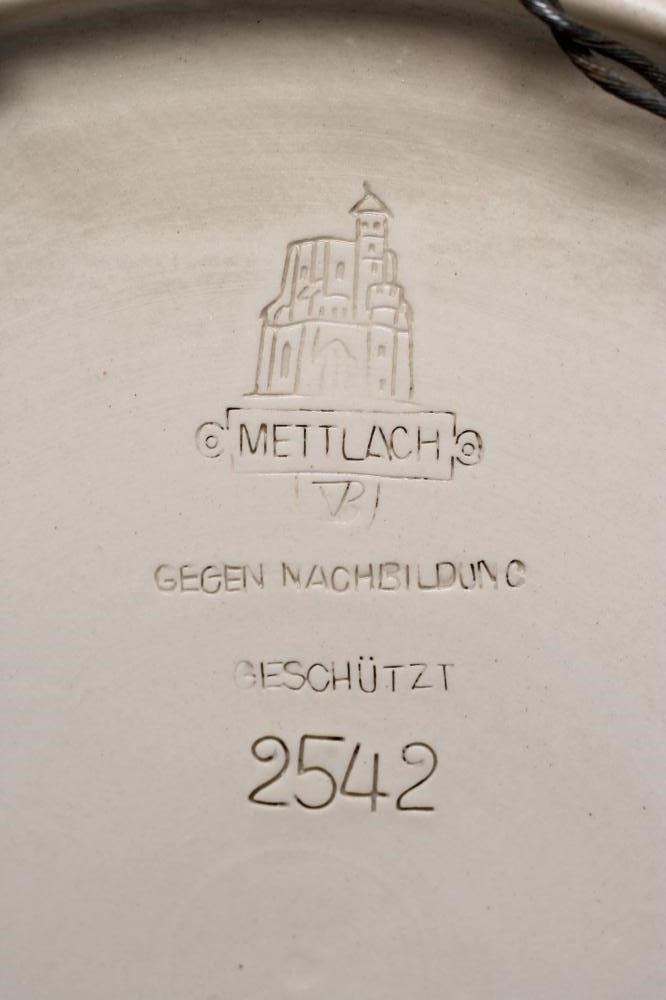 A METTLACH STONEWARE PLAQUE Image