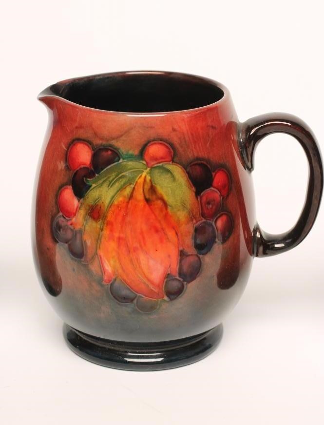 TWO SMALL MOORCROFT POTTERY FLAMBE VASES Image