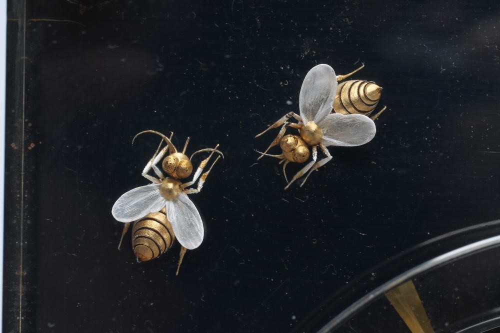 A JAEGER LECOULTRE GILT METAL AND PERSPEX MYSTERY TIMEPIECE Image