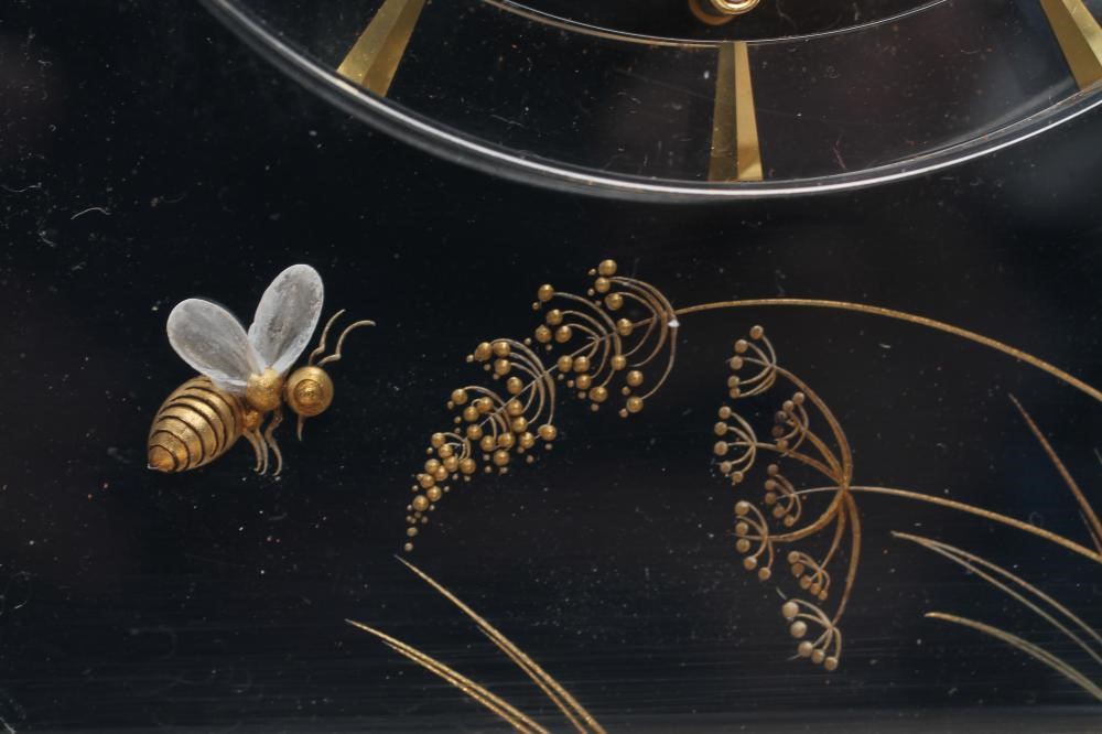 A JAEGER LECOULTRE GILT METAL AND PERSPEX MYSTERY TIMEPIECE Image