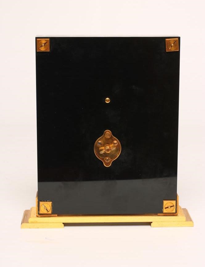 A JAEGER LECOULTRE GILT METAL AND PERSPEX MYSTERY TIMEPIECE Image