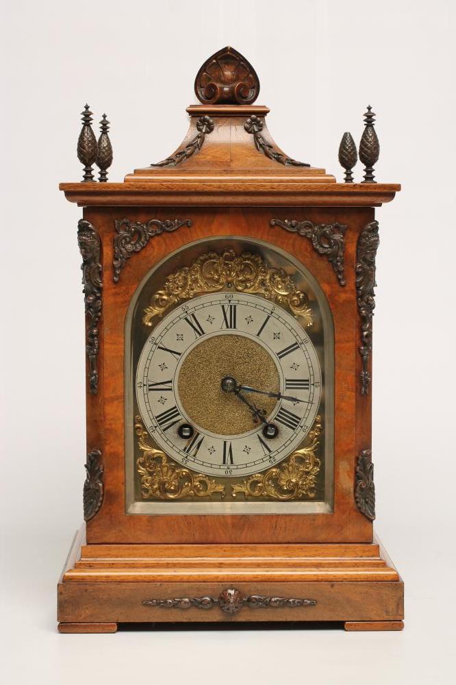 A WALNUT CASED TABLE CLOCK by Lenzkirch Image