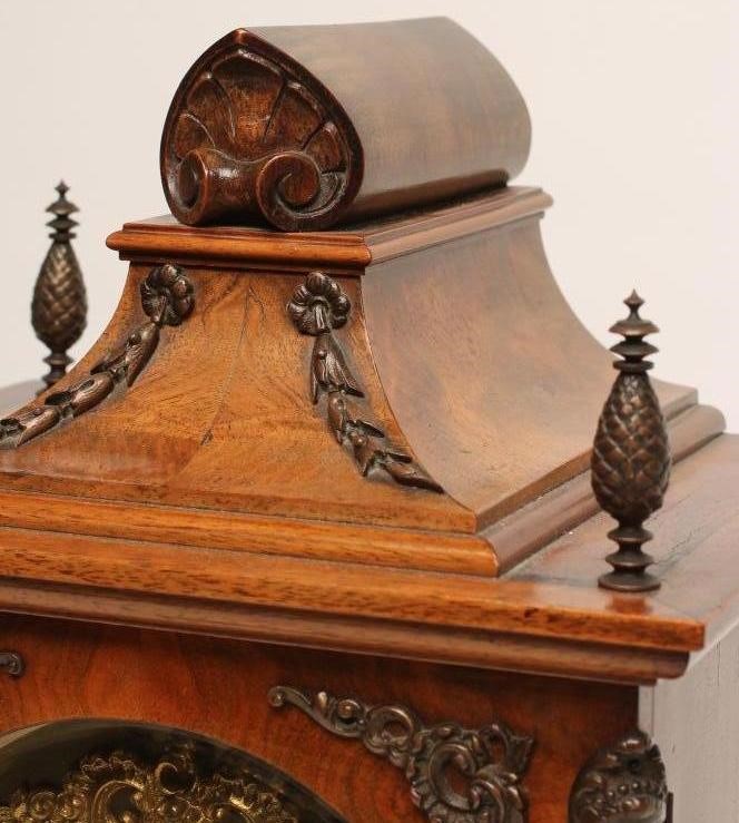 A WALNUT CASED TABLE CLOCK by Lenzkirch Image