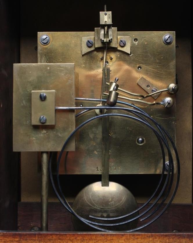 A WALNUT CASED TABLE CLOCK by Lenzkirch Image