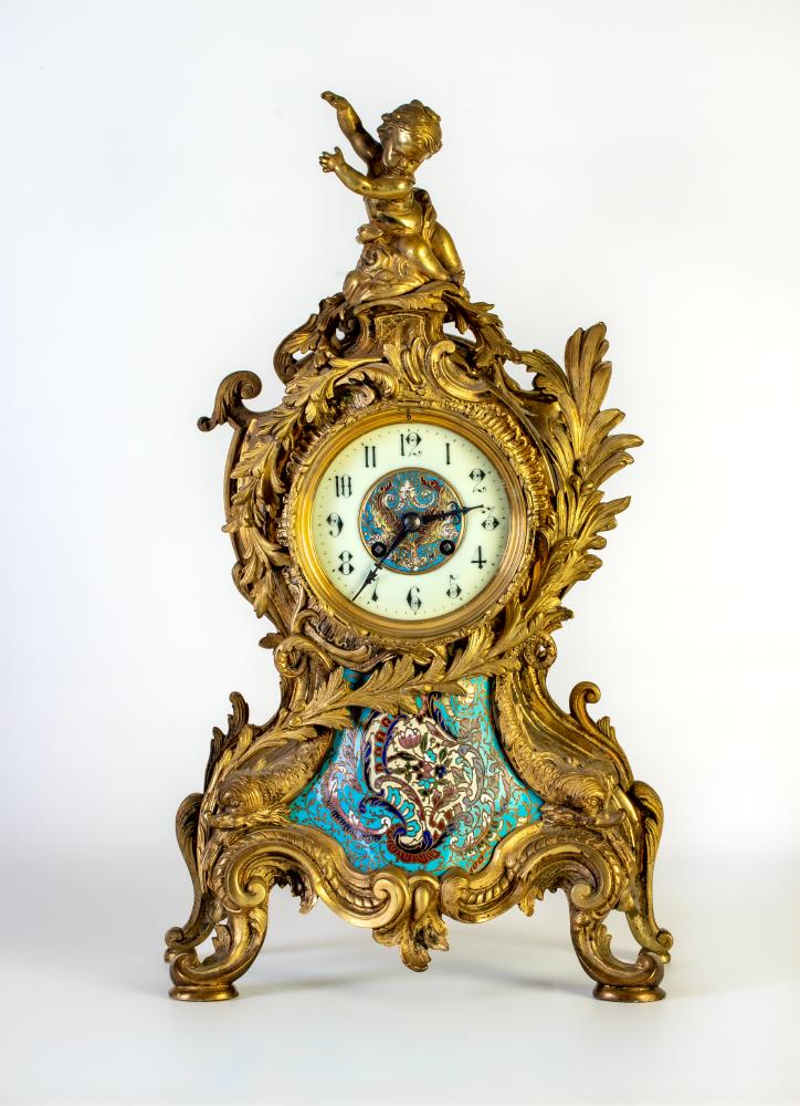 A FRENCH LOUIS XV STYLE ORMOLU AND CHAMPLEVE ENAMEL MANTEL CLOCK Image