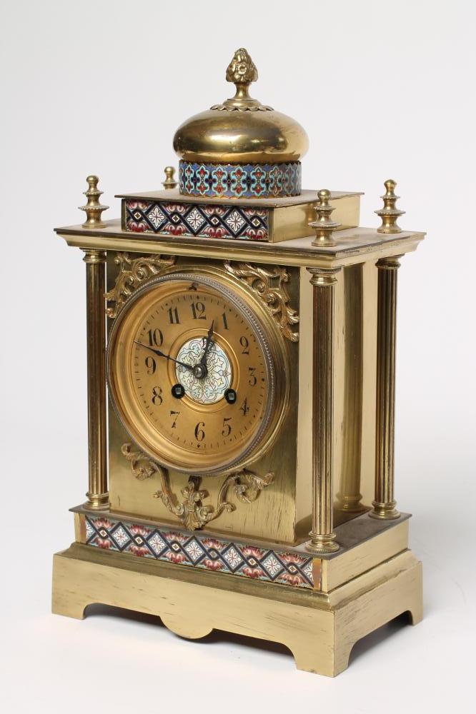 A FRENCH GILT BRASS AND CHAMPLEVE ENAMEL TABLE CLOCK Image