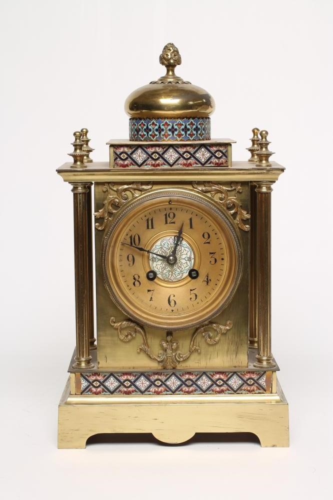A FRENCH GILT BRASS AND CHAMPLEVE ENAMEL TABLE CLOCK Image