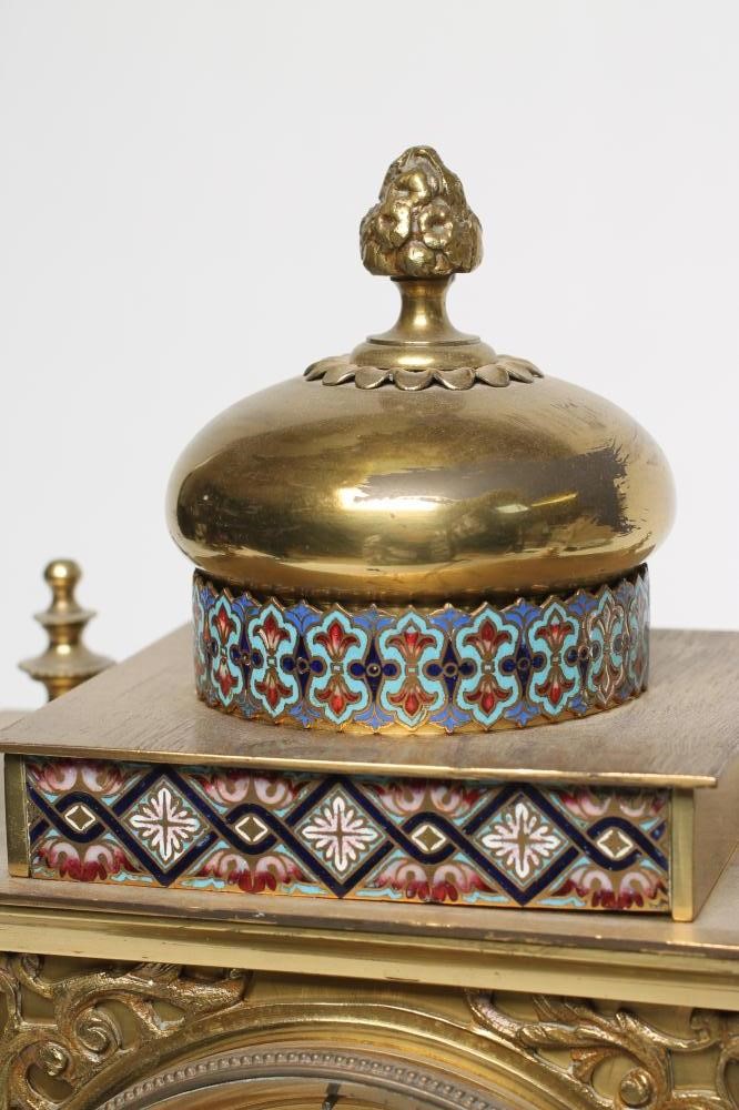 A FRENCH GILT BRASS AND CHAMPLEVE ENAMEL TABLE CLOCK Image