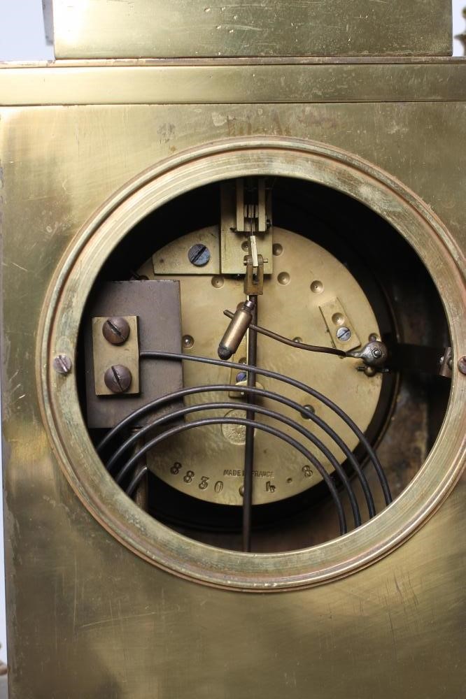 A FRENCH GILT BRASS AND CHAMPLEVE ENAMEL TABLE CLOCK Image