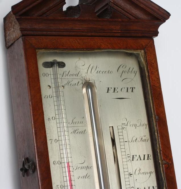 A MAHOGANY STICK BAROMETER signed Wicecia Gobby Image