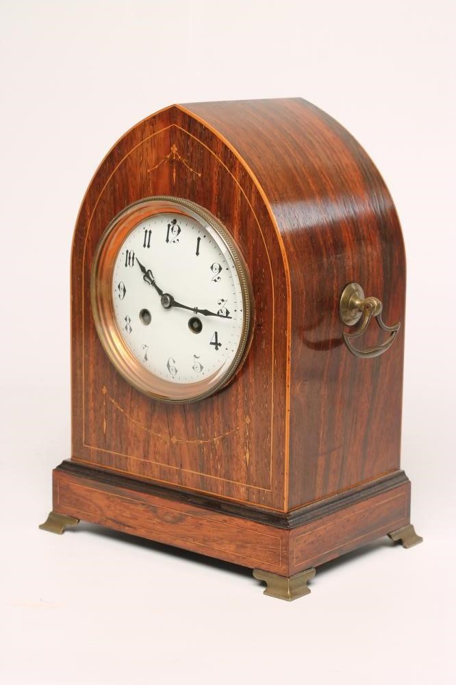 AN EDWARDIAN ROSEWOOD CASED TABLE CLOCK Image