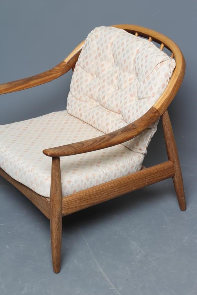 A GREAVES & THOMAS TEAK STICK BACK ARMCHAIR Image