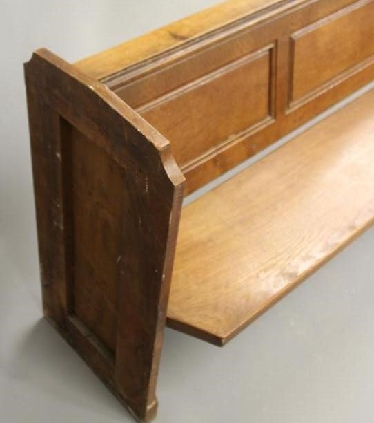 AN OAK CHURCH PEW by Robert Thompson to match the previous lot (Est. plus 21% premium inc. VAT) Image