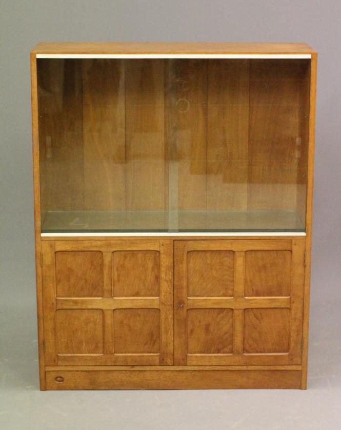 AN ADZED OAK BOOKCASE by Alan Grainger Image