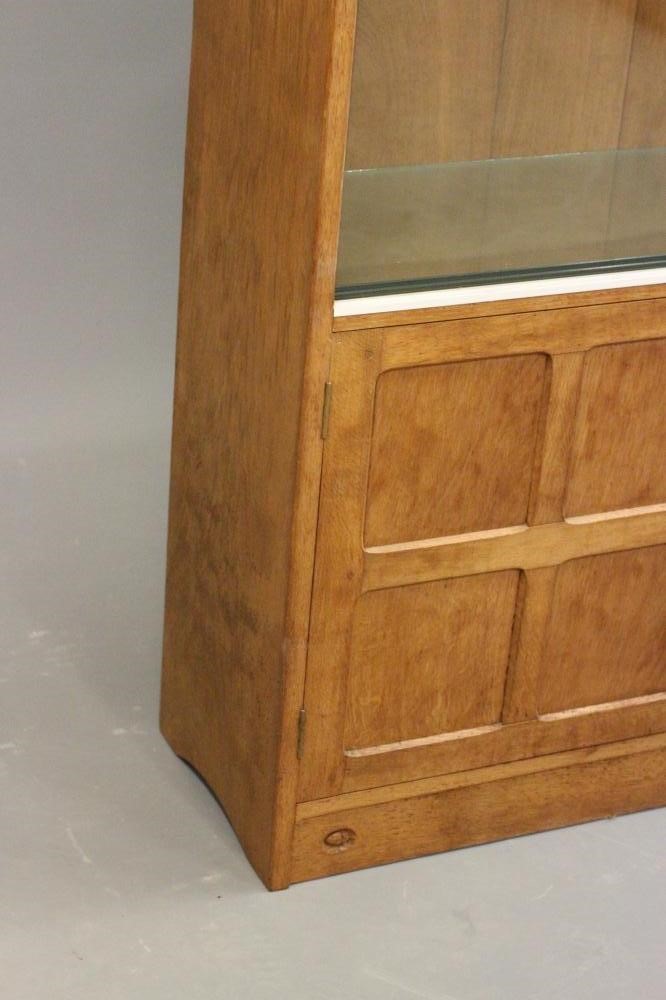 AN ADZED OAK BOOKCASE by Alan Grainger Image