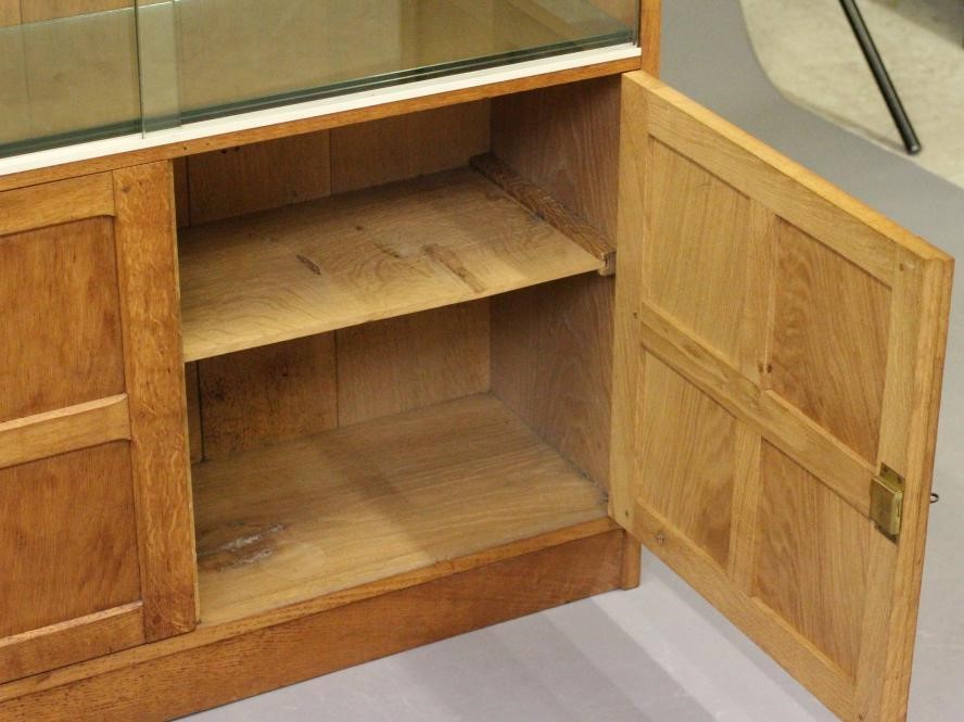 AN ADZED OAK BOOKCASE by Alan Grainger Image