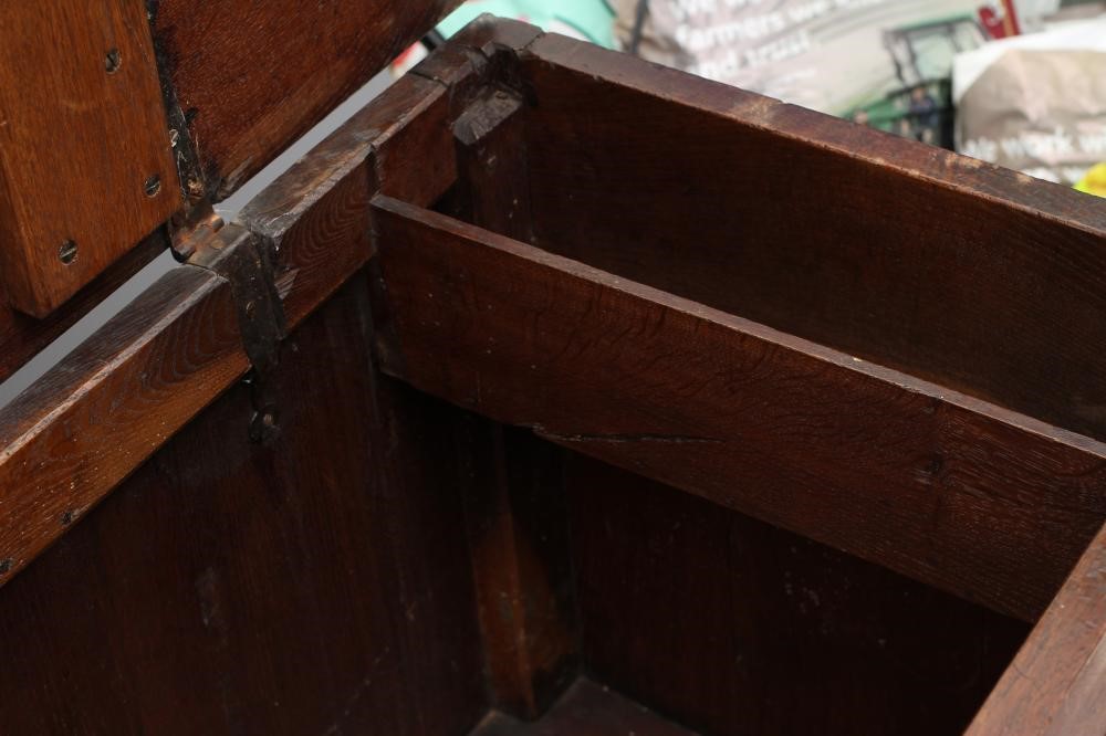 AN OAK PANELLED CHEST Image