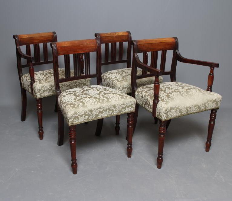 A SET OF FOUR GEORGE IV MAHOGANY DINING CHAIRS including two elbow chairs upholstered in pale green Image