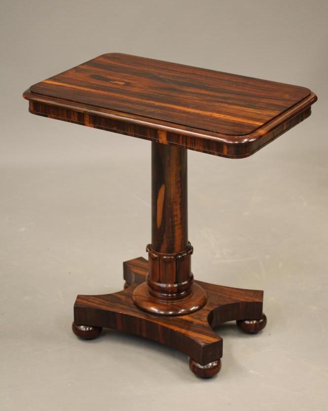 AN EARLY VICTORIAN ROSEWOOD OCCASIONAL TABLE of rounded oblong form Image