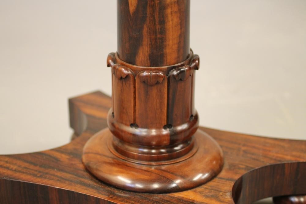 AN EARLY VICTORIAN ROSEWOOD OCCASIONAL TABLE of rounded oblong form Image