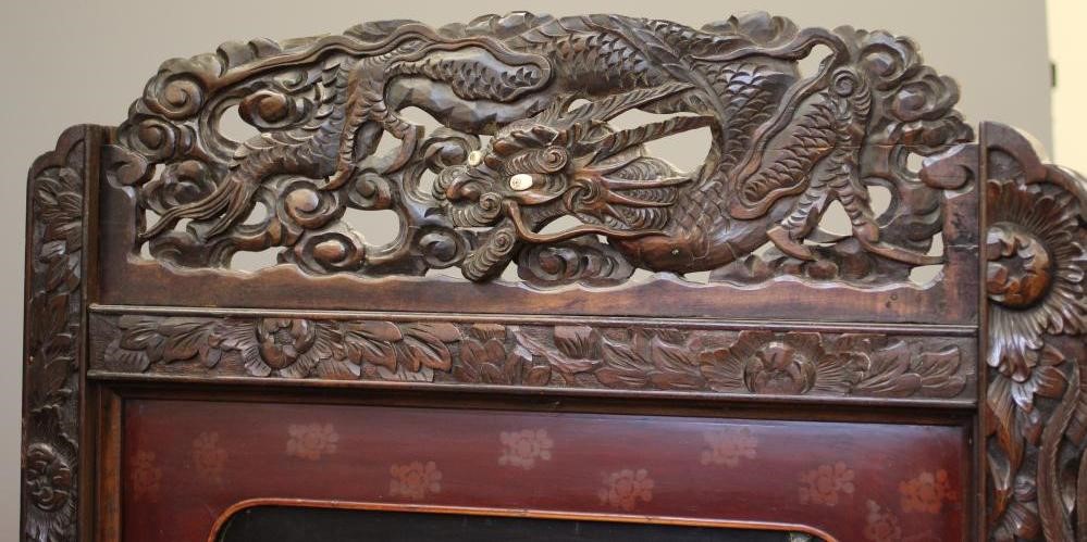 A CHINESE PADOUK WOOD AND IVORY FOLDING ROOM SCREEN Image